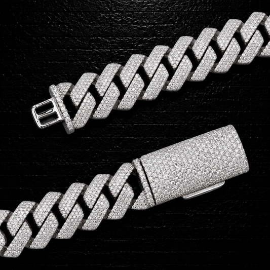 Silver chain bracelet on a black textured background